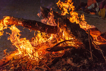 Bonfire in the still of night.