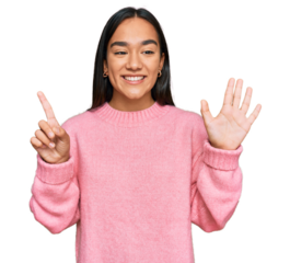 Young asian woman wearing casual winter sweater showing and pointing up with fingers number six while smiling confident and happy.