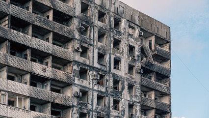 Fototapeta premium destroyed and burned houses in the city in Ukraine