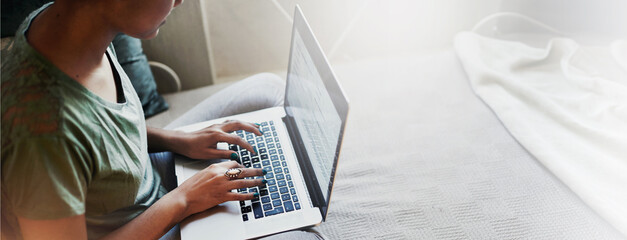 Laptop, hands typing and student in bedroom for philosophy assignment, research and knowledge....