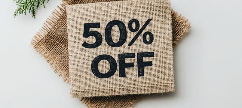 Rustic Burlap Fabric Sign Displaying a 50 Off Discount, Perfect for Sales and Promotions