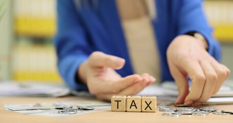 An image depicting tax preparation activities in a professional office, highlighting financial organization.