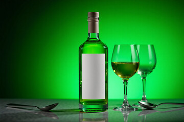 Mockup of an absinthe bottle with a sleek design, featured on a unique background, ideal for highlighting branding and label designs