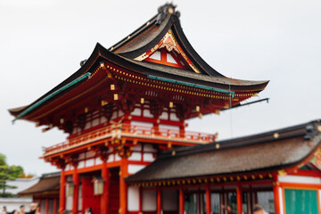 Fushimi Inari Taisha Shrine, Fushimi-ku, Kyoto Prefecture, Kansai region, Kyoto, Japan, Shinto shrine, mountain way with red torii gates tunnel, wooden torii path, fox sculptures, travel to Japan