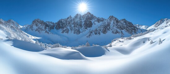 Sunlit snow-covered mountain range.