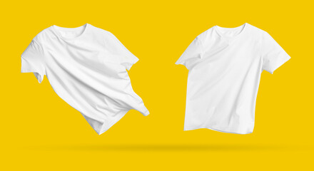 White t-shirts in air on golden background