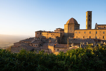 Fototapeta premium Panoramic view over Volterra at sunset. Iconic hilltop town in Tuscany, Italy