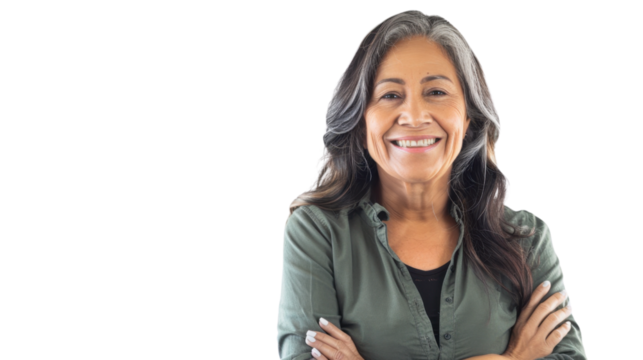 Portrait of mexican middle age businesswoman with arms crossed on white background
