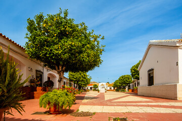 Beautiful traditional Square with old wells, Frederico Maya street, Ayamonte, Spain