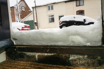 Shropshire, UK, 10-12-2017. People around the UK woke up to several inches of snow on their...