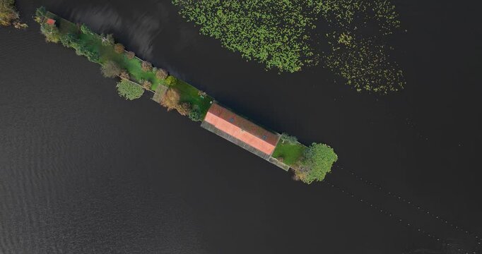 Small houses at the Loosdrechtse Plassen, Scheendijk, marina of Breukelen, The Netherlands, nature reserve with tow holes and legakkers