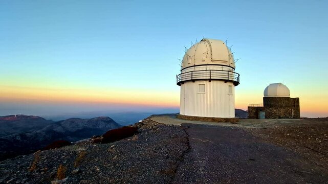 Panning view at telescope building of Skinakas observatory, Crete, sunset Mount ida landscape
