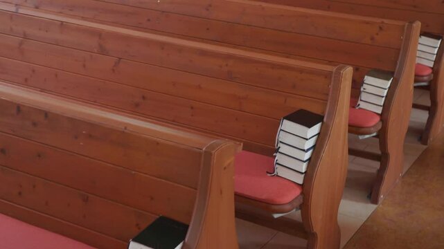 songbooks lying in pews in church