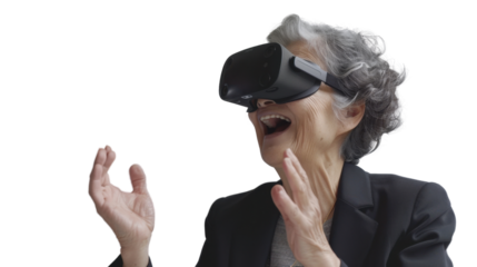 Asian caucasian senior businesswoman watching vr glasses laughing and gesturing with hand on white background
