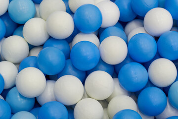 Blue and white plastic balls 
