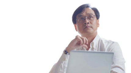 Asian middle age male Employee IT specialist sit at work with laptop on white background
