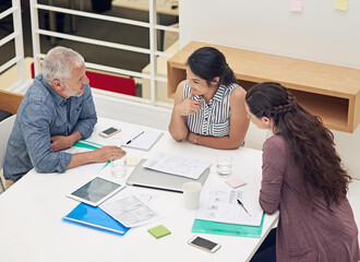 Naklejka premium Architect, meeting and team planning in office with budget strategy, financial framework and renovation cost analysis. Architecture, happy people and discussion with documents for remodeling project