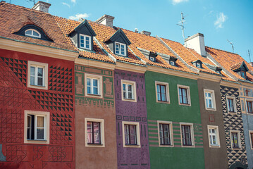 Colorful facades of buildings on the Main Square (Rynek) in Poznań, Poland, showcasing vibrant...