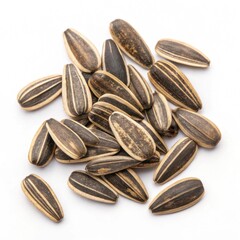Obraz premium Small striped sunflower seeds scattered on a white background for culinary uses