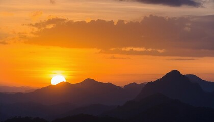 Obraz premium Sunset Silhouette of Majestic Mountains