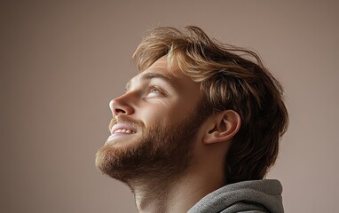Obraz premium A man wearing color casual clothing with smiling, side view, portrait