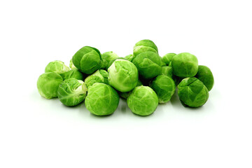Fototapeta premium Fresh Brussels sprouts isolated on white background. Brussels sprouts are a typical winter vegetable.