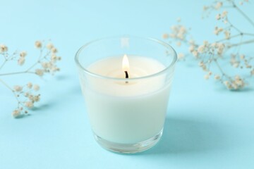 Aromatic candle on color background 