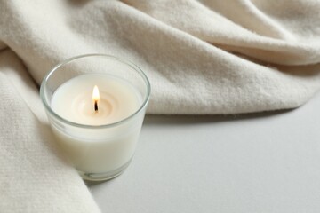 Aromatic candle on gray background 