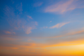 Obraz premium Morning orange sky and clouds background,Sunset sky for background or sunrise sky and cloud at morning.
