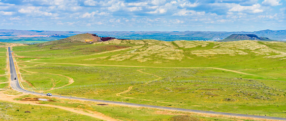 Naklejka premium Ulanqab Ulanhada Volcanic Grassland Highway in Ulanqab, Inner Mongolia, China