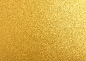 grainy new gold foil texture. smooth flat golden leaf paper abstract bright metallic yellow brass luxury plain background