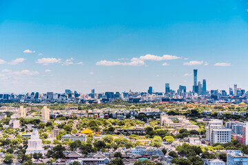 Obraz premium High view scenery of Beijing International Trade CBD and White Pagoda Temple in Beijing, China