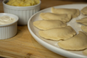 Dumplings on a plate close-up. Homemade food, Healthy eating.