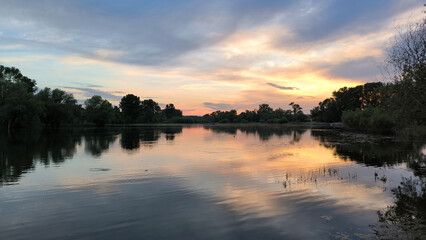 Fototapeta premium sunset by the Danube river in Novi Sad