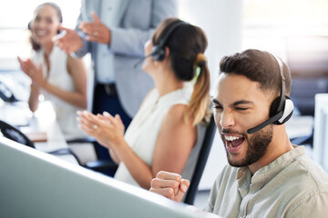 Man, call center and celebration with fist at computer for reaching target, bonus and deadline....
