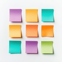 Fototapeta premium Colorful sticky notes arranged in grid pattern on white background, showcasing vibrant hues of purple, orange, and green