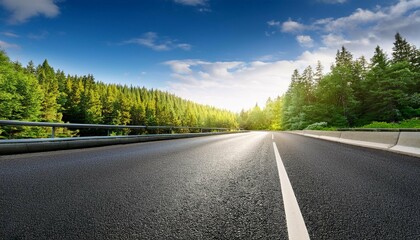 Obraz premium empty asphalt road and green forest landscape