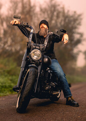 Naklejka premium person sitting on a motorcycle