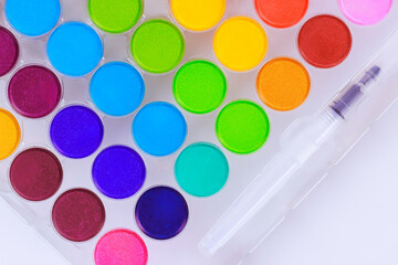 Rainbow of colors, ready to use watercolor paint palette for artists hobbyists.
