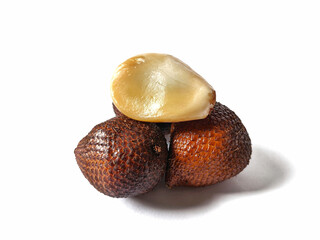 Selective focus on snake fruit or buah salak or Salacca zalacca isolated on white background.