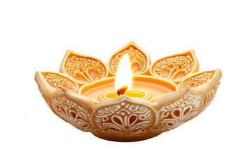 A beautifully crafted lotus shaped candle glows softly with a flame at its center, enhancing the tranquility of its surroundings. The intricate design showcases delicate patterns that add elegance to 