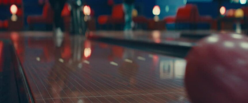 bowling ball thrown down lane