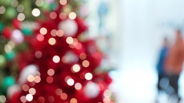 Slow Motion: Christmas lights and Christmas trees, people walking.Elements and concepts of Christmas.