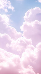 Fototapeta premium A serene sky filled with soft pink and white clouds, creating a tranquil atmosphere.