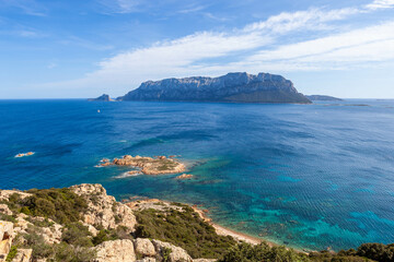 Amazing aerial view of crystal clear vibrant emerald blue turquoise Mediterranean sea and island...