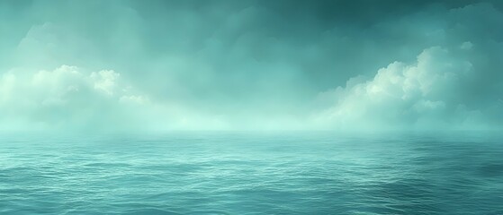 Obraz premium A serene seascape featuring calm turquoise waters under a misty sky, evoking a tranquil and ethereal atmosphere, perfect for relaxation and reflection.