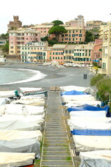 Boats in storage on the beach. Genoa beach.