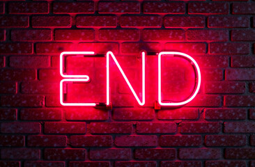 Neon sign on a brick wall with the word END.