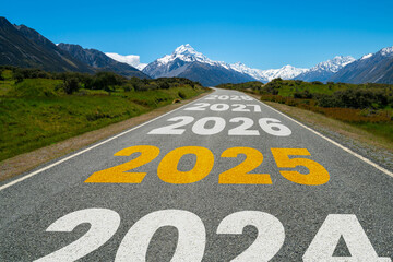2025 New Year road trip travel and future vision concept . Nature landscape with highway road leading forward to happy new year celebration in the beginning of 2025 for elation and successful start .