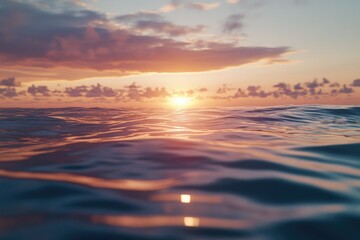 Obraz premium A beautiful sunset scene with the sun setting over calm ocean waters